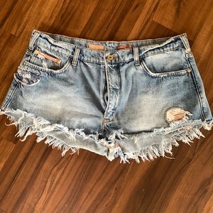 Pilcro high-waisted jean cutoff shorts.